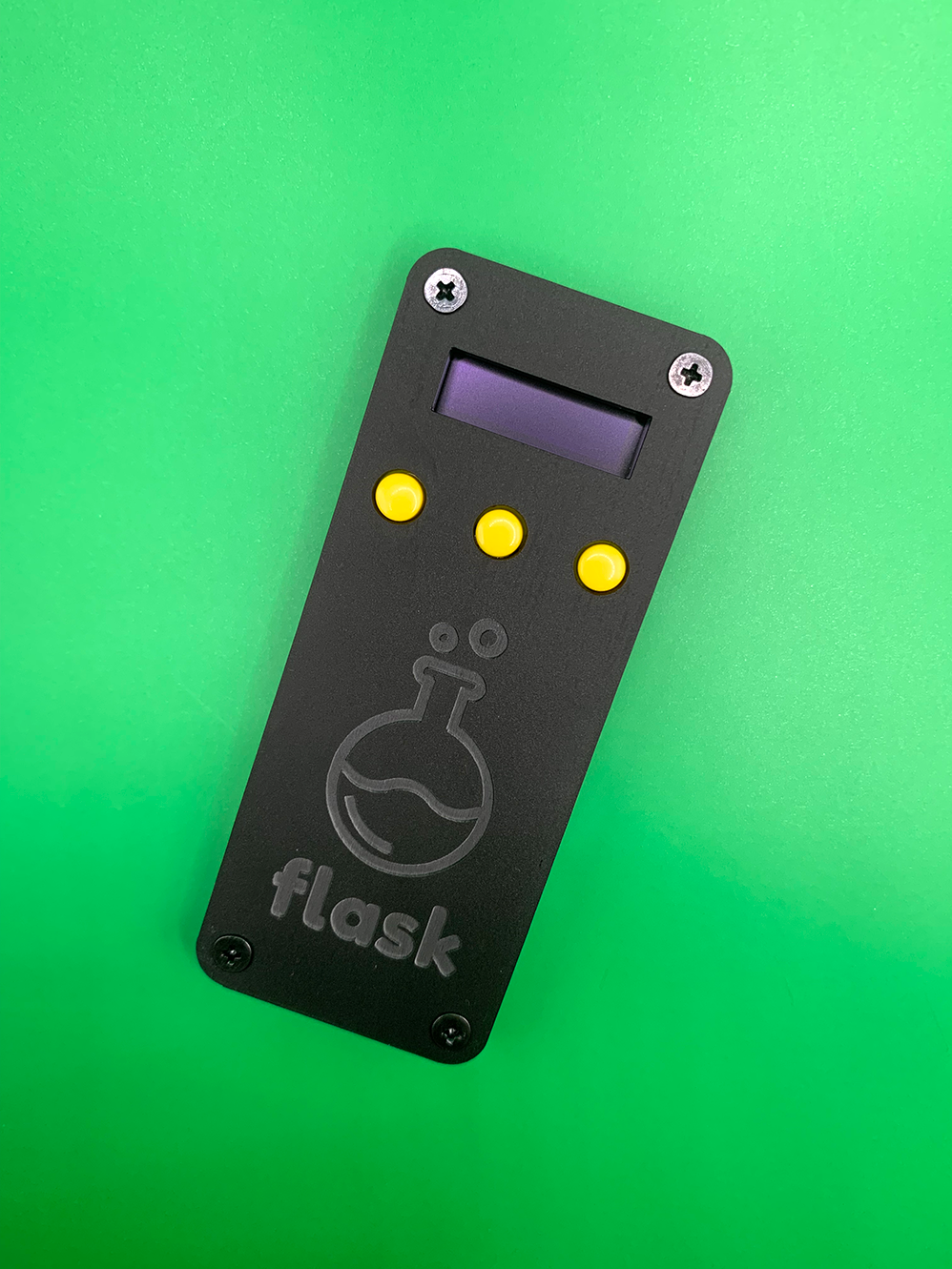 Black Flask with Yellow Buttons