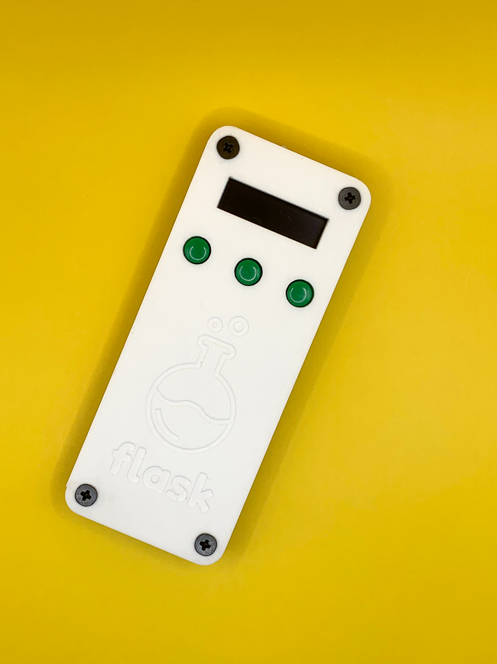 White Flask with Green Buttons
